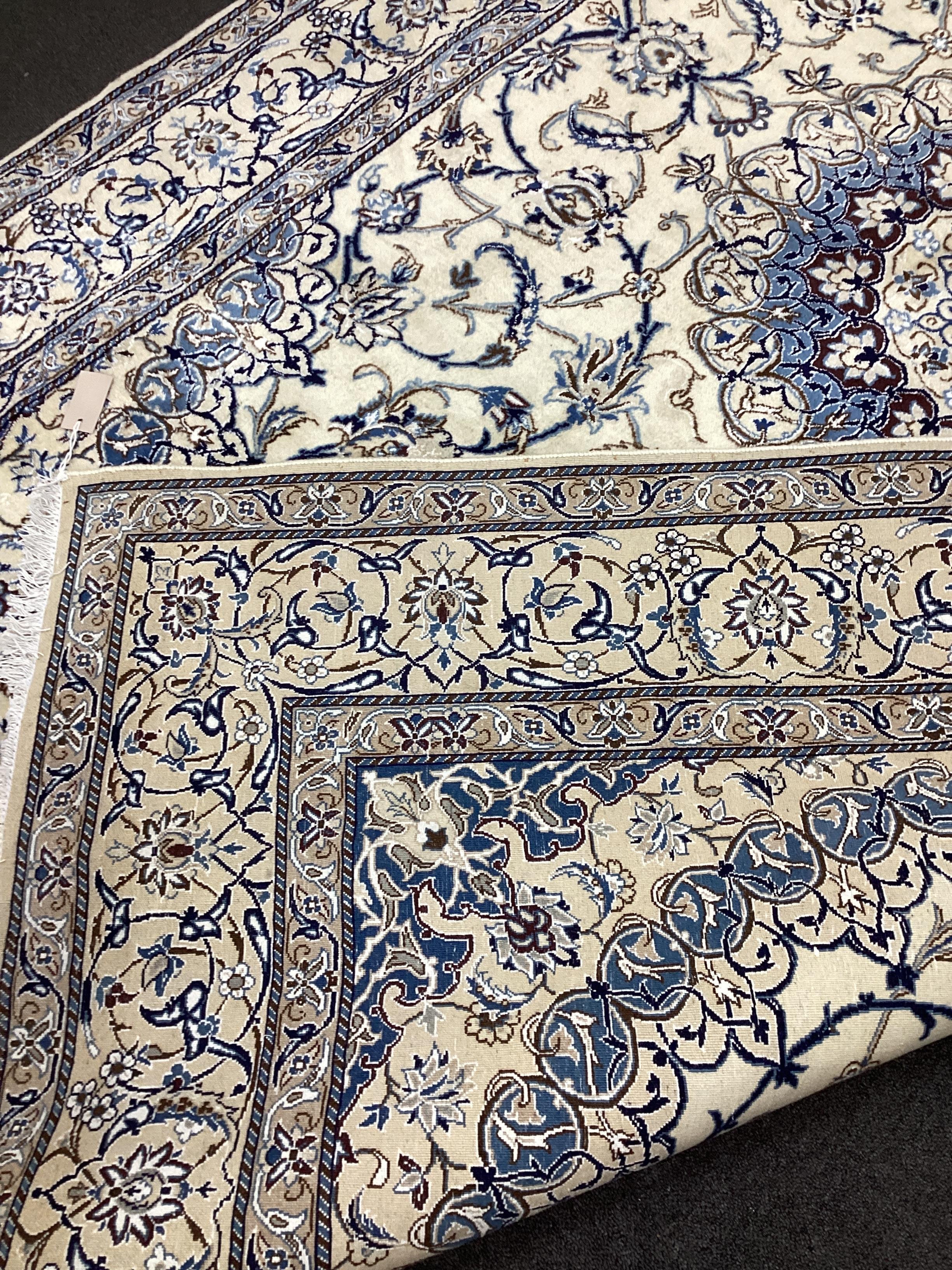A fine Nain ivory ground carpet, 286 x 195cm